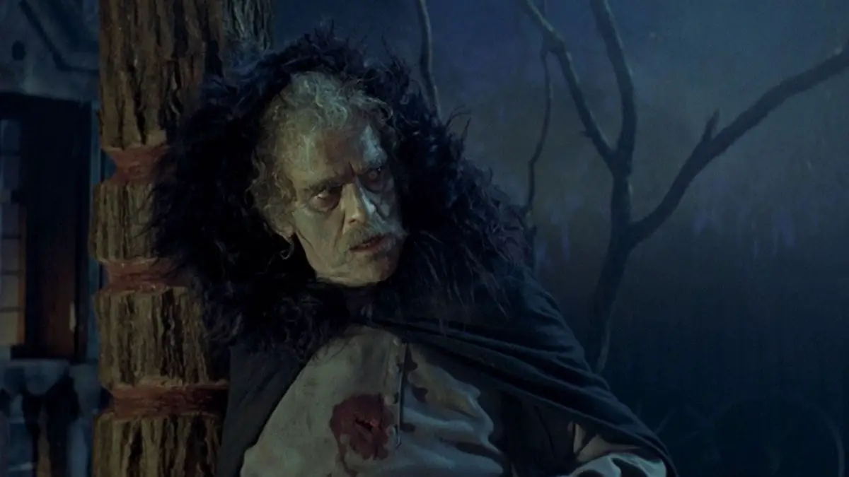 Boris Karloff as a wurdulak, staring into the distance with a piercing glare.